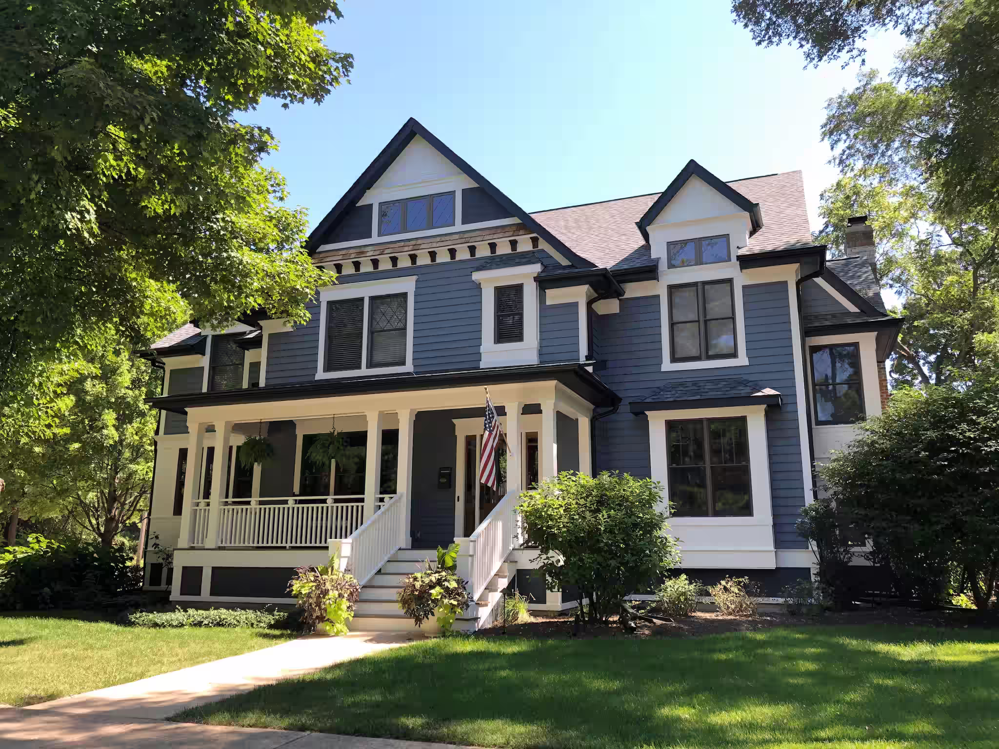 Asphalt shingle roof treated with Roof Maxx